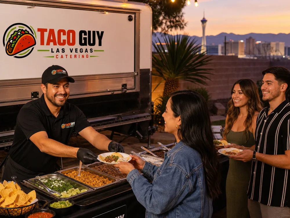 Backyard taco man setup at dusk in Las Vegas with string lights, a serving table, and guests lining up with plates