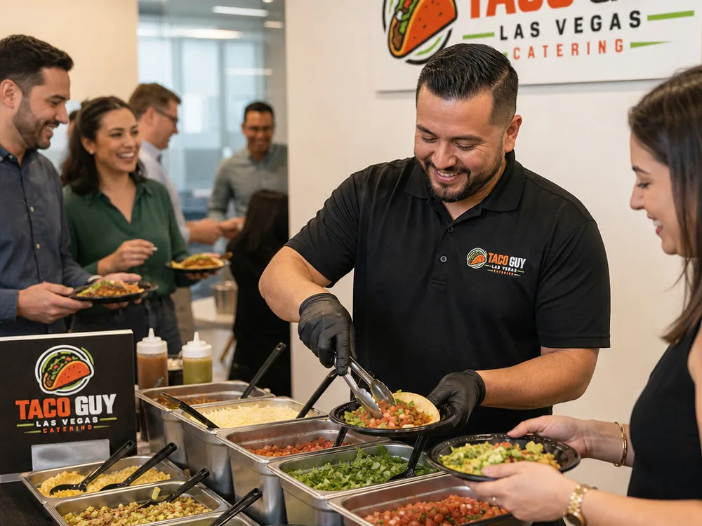 Compact taco bar at an office lunch with guests, warming pans, and labeled salsas and toppings